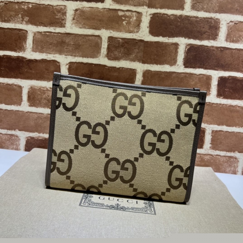 G*u*i clutch bags